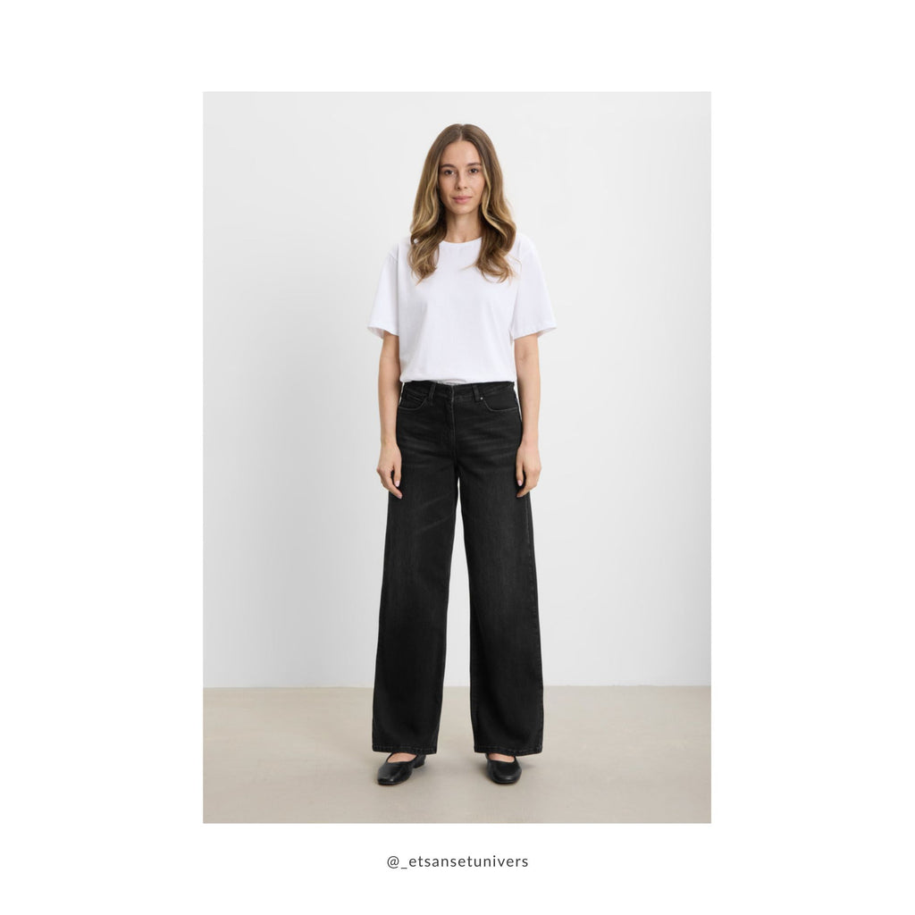 Løse denim bukser i washed black OEKO-TEX® bomuld – styling forslag - Et Sanset Univers