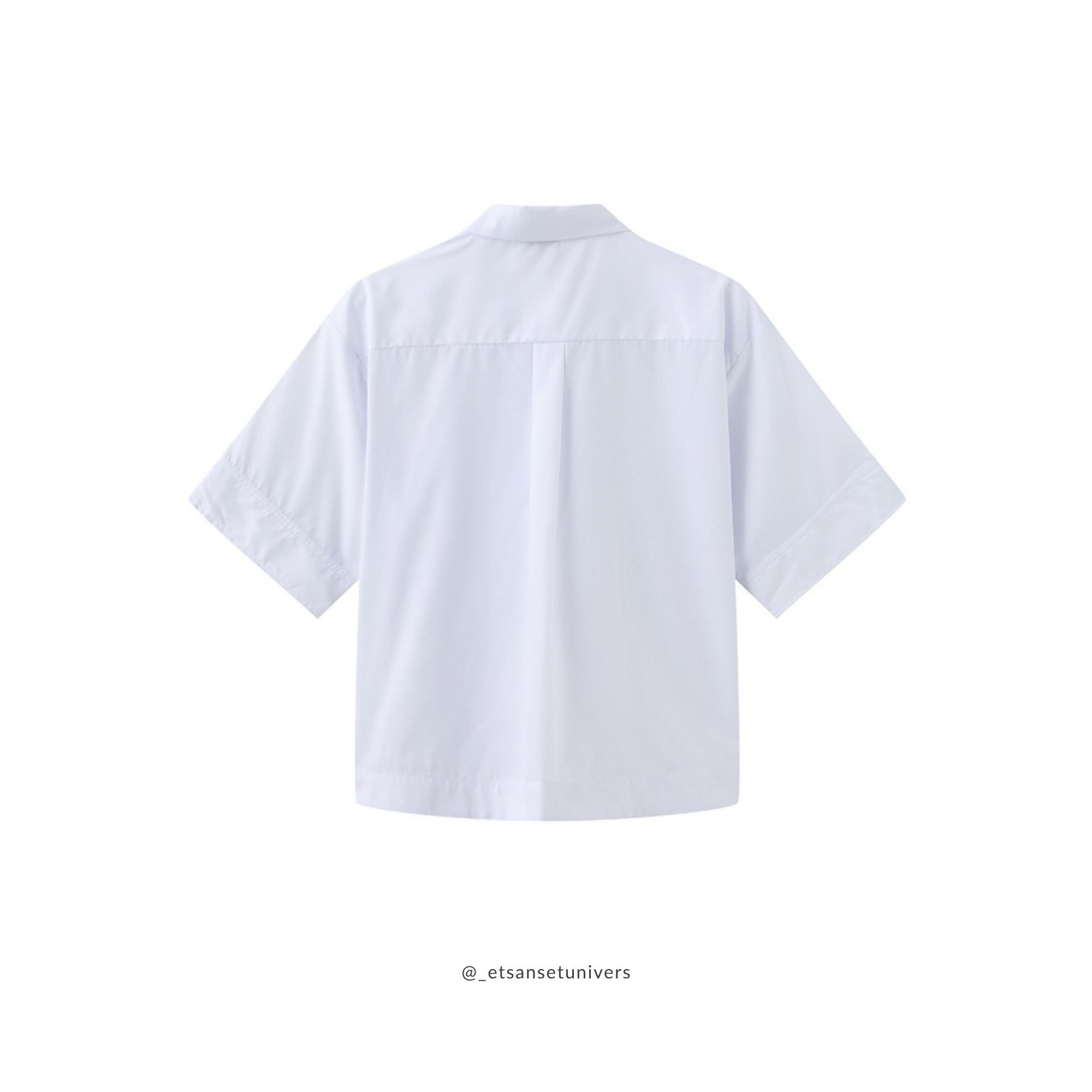 Elene skjortebluse i Off-white bagfra – et delikat snit i bløde linjer, let som en sommerdag mod huden