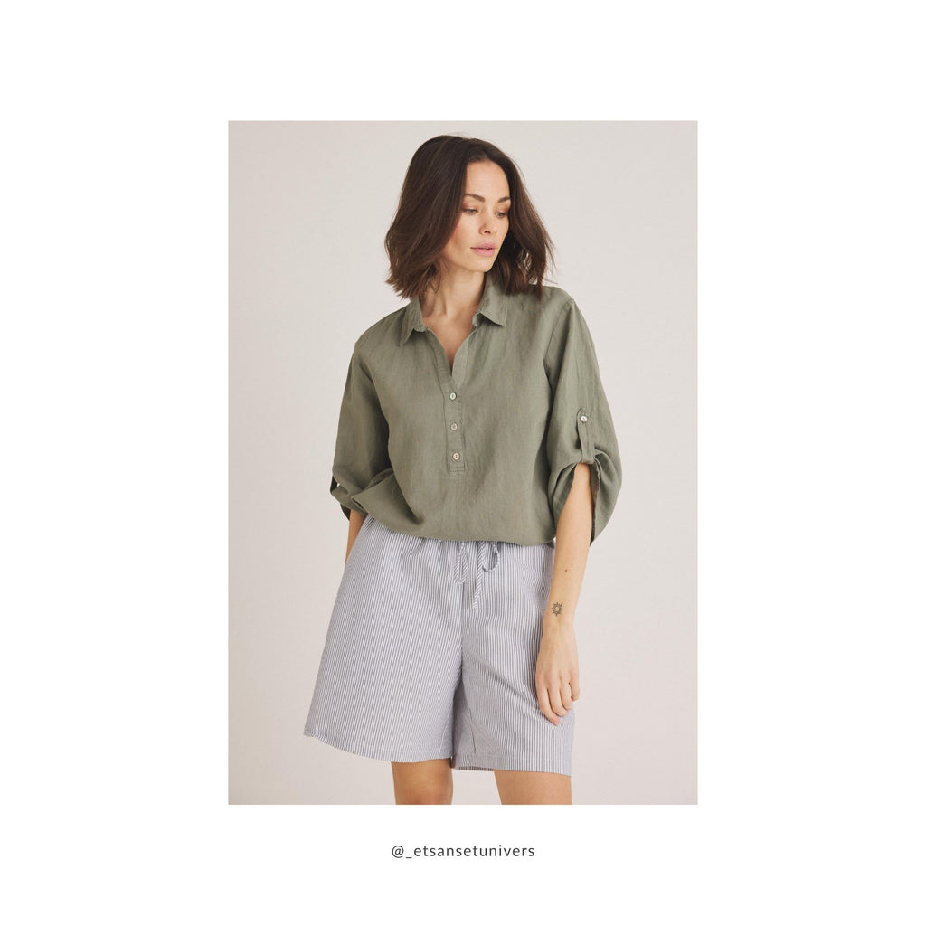 Elilisho Shorts i Black Pepper stylet med afslappet grøn hørbluse med opsmøg på ærmerne – effortless og klassisk sommerlook - Et Sanset Univers