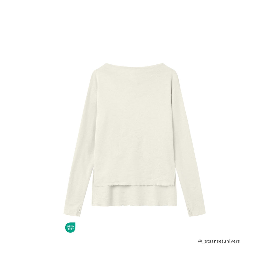 Merinould OEKO-TEX® bluse med høj slids i raw white – Et Sanset Univers