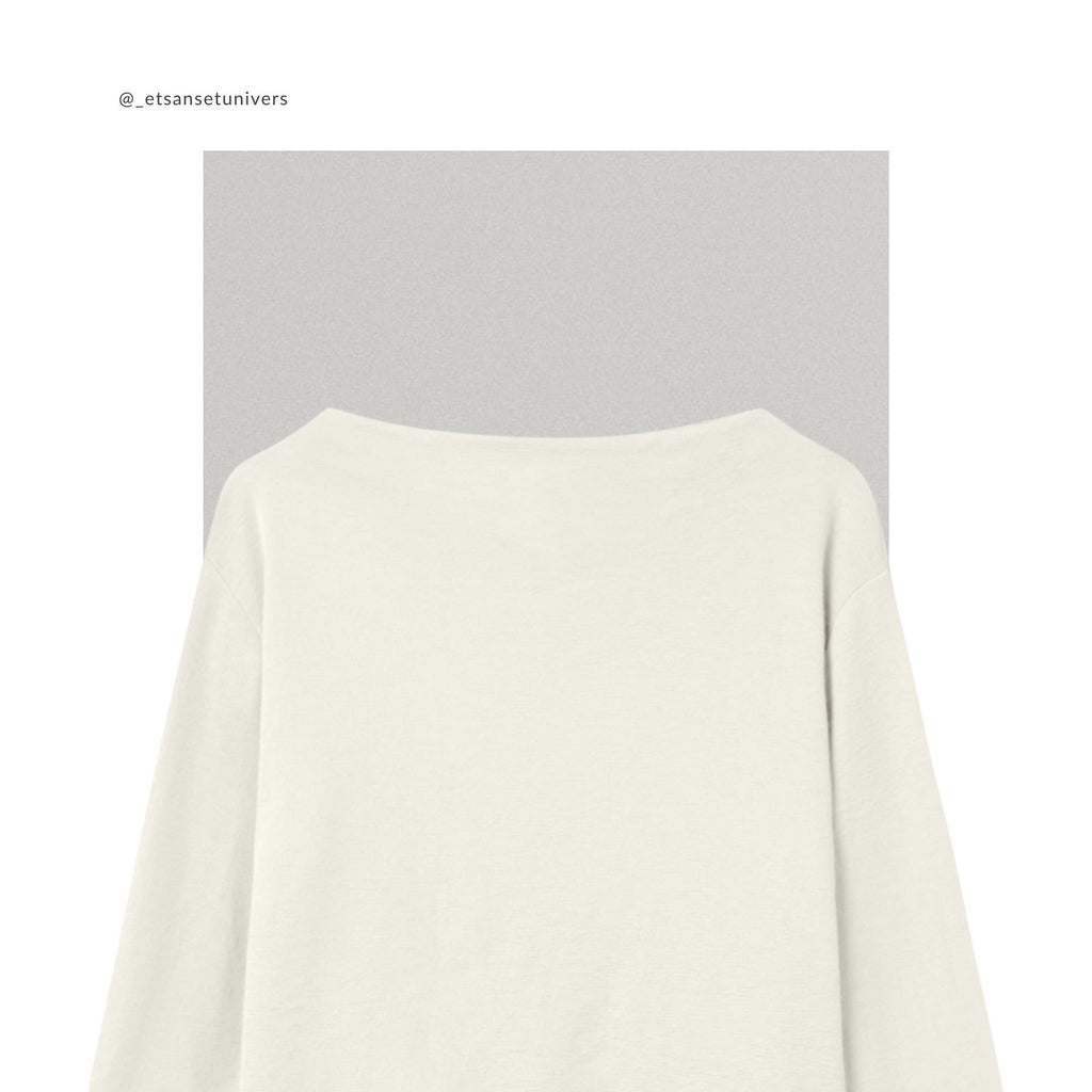Merinould OEKO-TEX® bluse med høj slids i raw white – close up hals - Et Sanset Univers