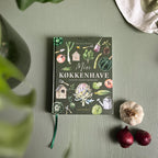 Bog om køkkenhave med havelog og kalender - stiliseret med grøntsager – Et Sanset Univers