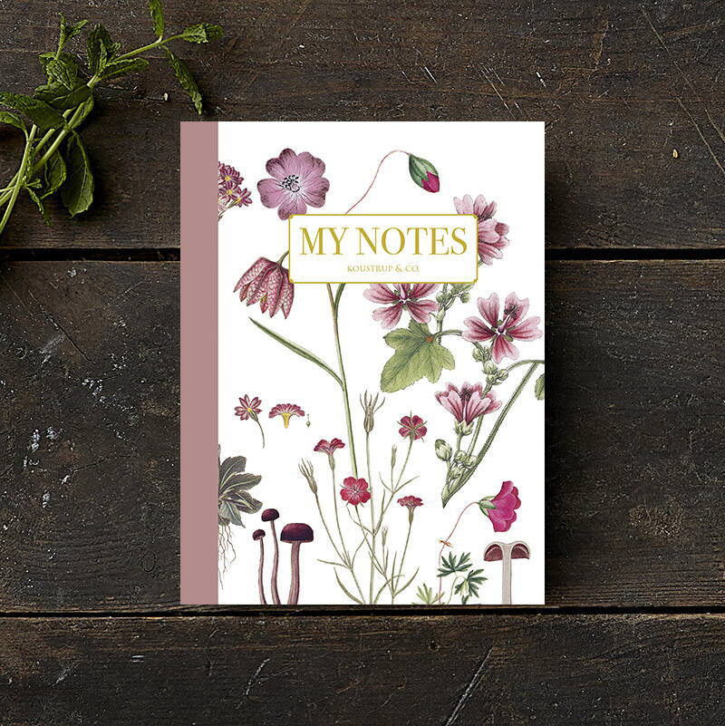 Noteshæfte med pink blomstermotiv – stiliseret - Et Sanset Univers