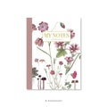 Noteshæfte med pink blomstermotiv – Et Sanset Univers